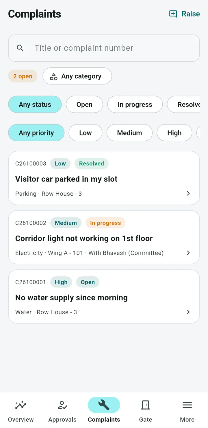 Committee app complaints list with status and priority filters and a ticket number on each complaint