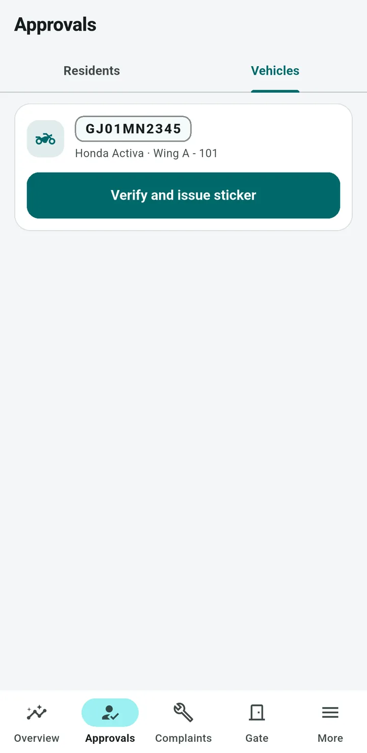 Committee app Approvals screen on the Vehicles tab: a resident’s bike waiting, with a Verify and issue sticker button