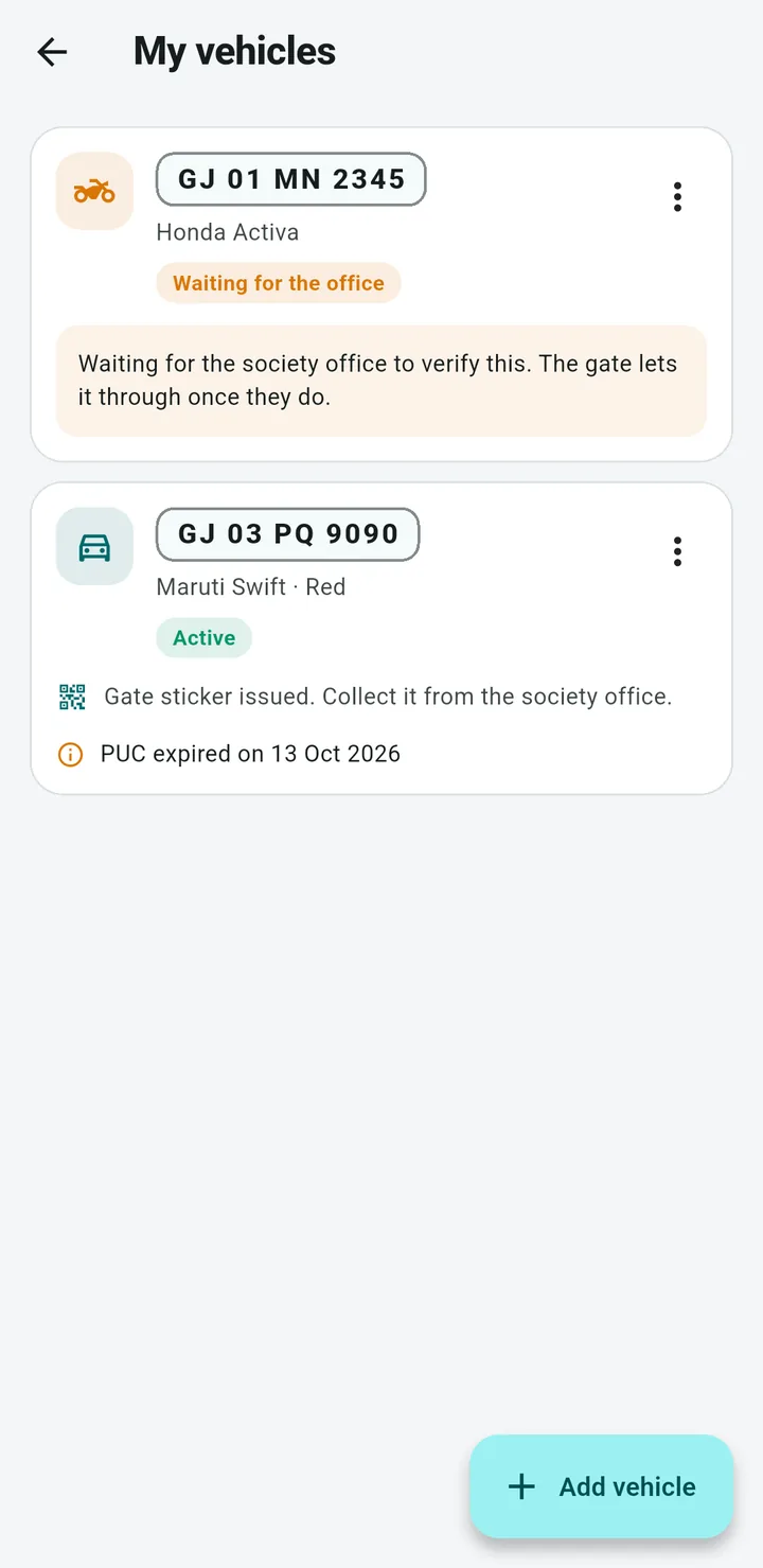 Resident app listing two vehicles, one waiting for office verification and one with its gate sticker issued